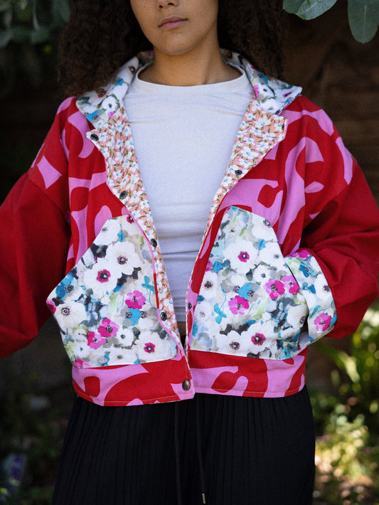 Red and pink cropped jacket with vine print